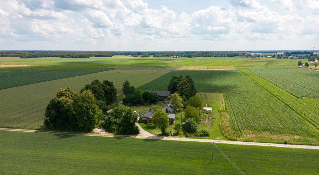 View from the Air of Kampinski Campground and Accomodation, surrounded by fields, our Linden Trees what gives us privacy.
